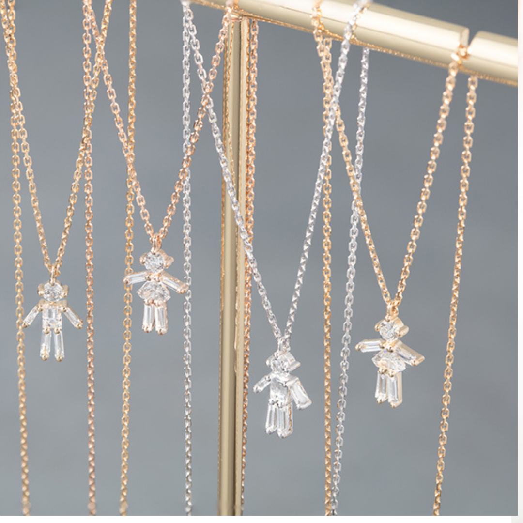 Diamonds and 18Kt Yellow Gold Girl & Boy Necklace
