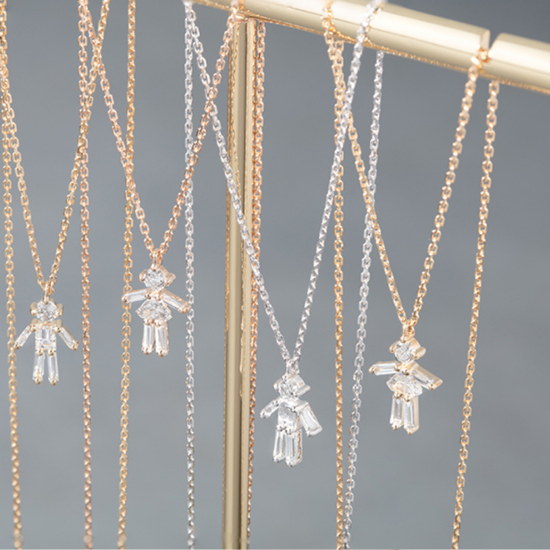 Diamonds and 18Kt Yellow Gold Boy Necklace